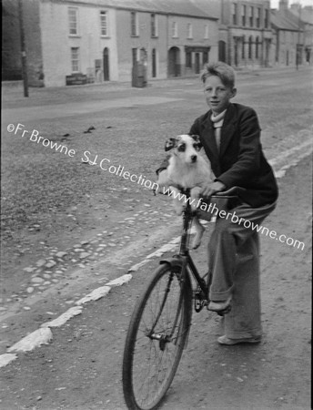 BOY WITH DOG ON BIKE